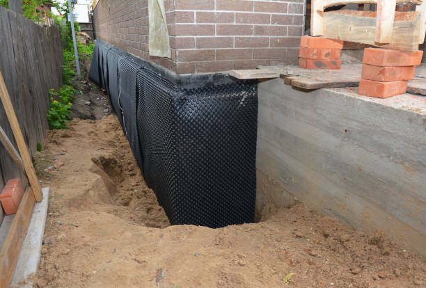 SJ Waterproofing Pros technician performing targeted Foundation Crack Repair assessment in Newport, KY
